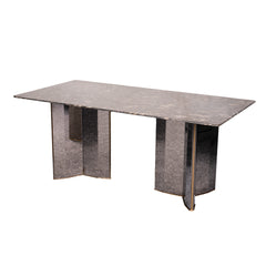 Modern dining table with marble-like surface and metallic legs on a white background