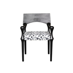 Chair with floral-patterned seat on a white background